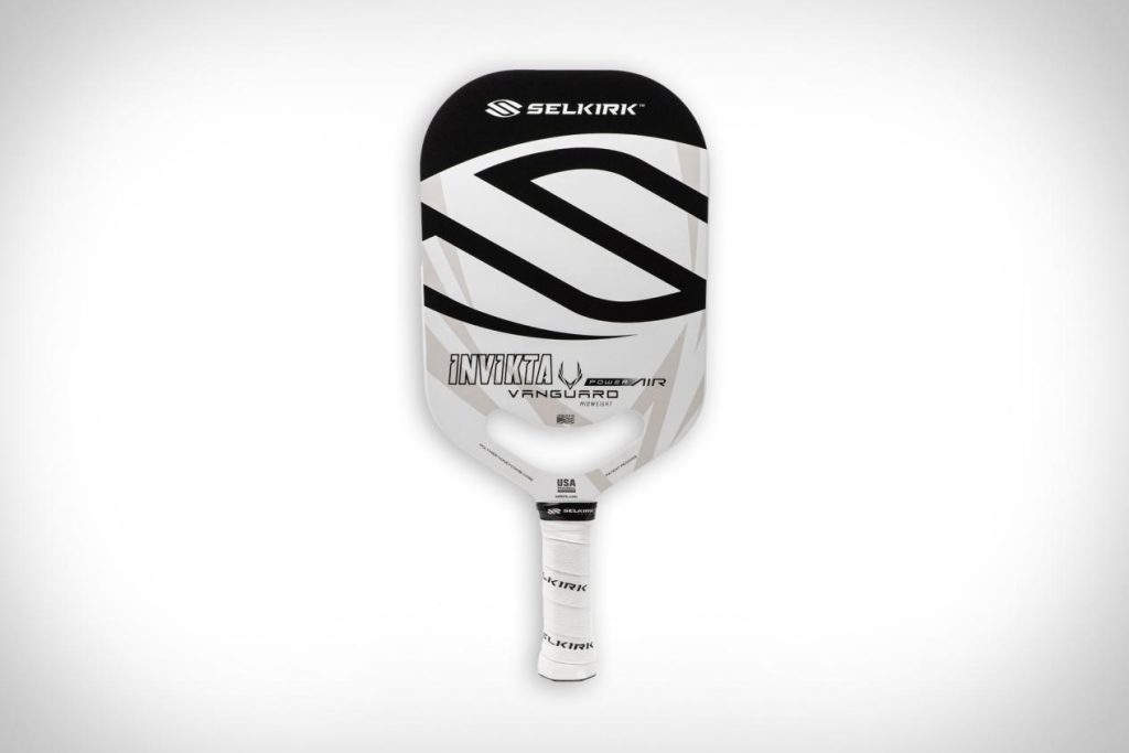 White Selkirk Vanguard Power Air Invikta pickleball paddle featuring an aerodynamic open throat design